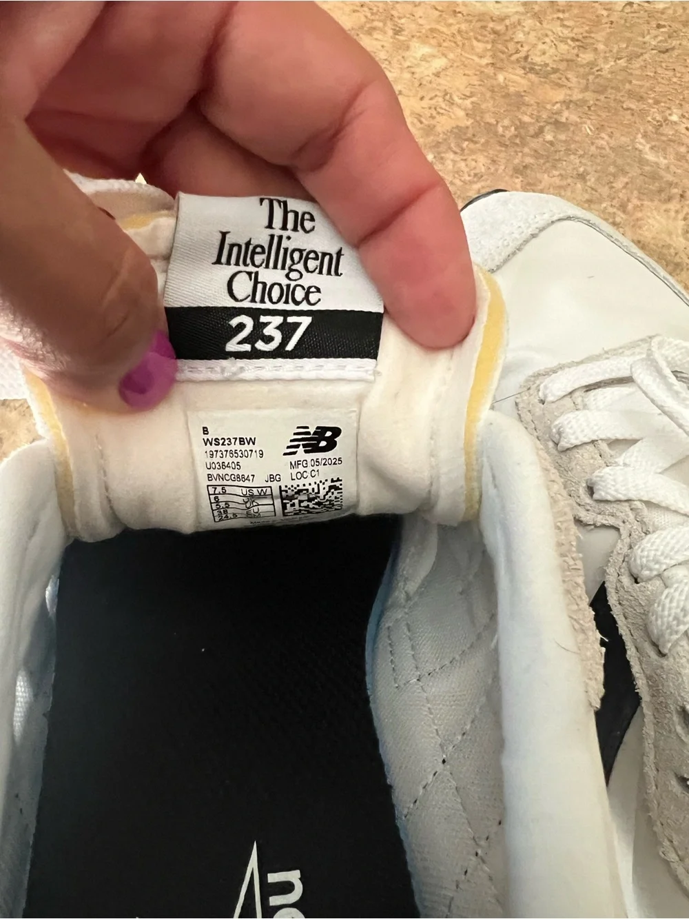 New Balance Women’s White and Black Retro-Style Sneakers